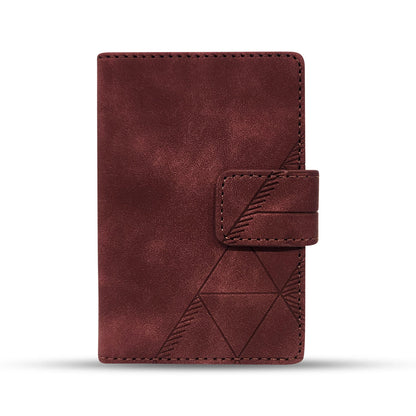 Burgundy leather wallet with geometric stitching design and secure strap closure