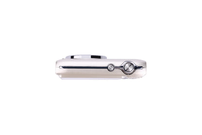Sleek silver digital camera with chrome accents and textured buttons