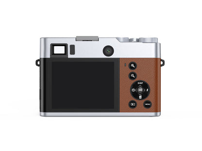 Compact digital camera with leather grip, rear LCD, and control buttons for photography