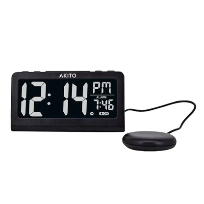 Digital alarm clock displaying 12:14 PM with 7:46 alarm, sleek black design, connected sensor