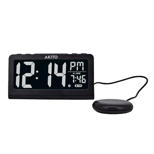 Digital alarm clock displaying 12:14 PM with 7:46 alarm, sleek black design, connected sensor